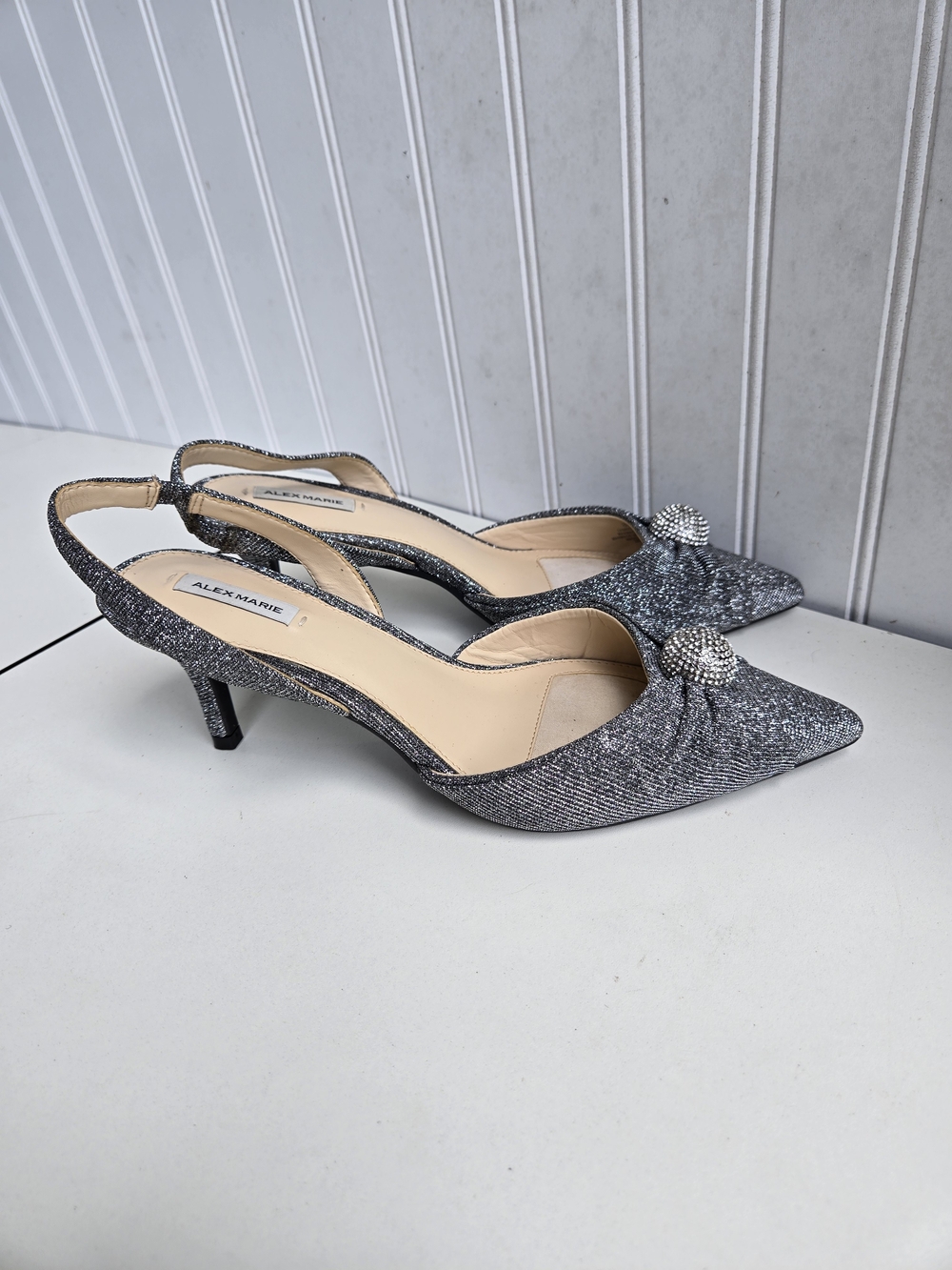 Women "Alex Marie" silver sparkeling point toe sling back heels. Size 8m